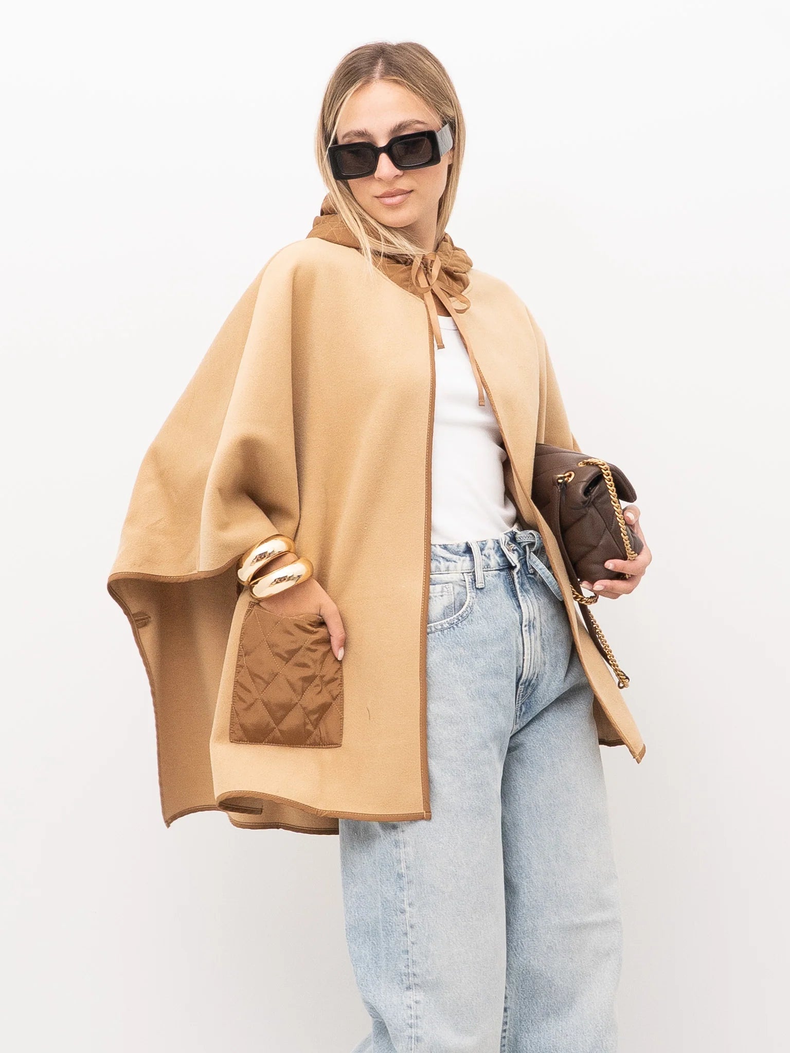 Knit poncho with pockets