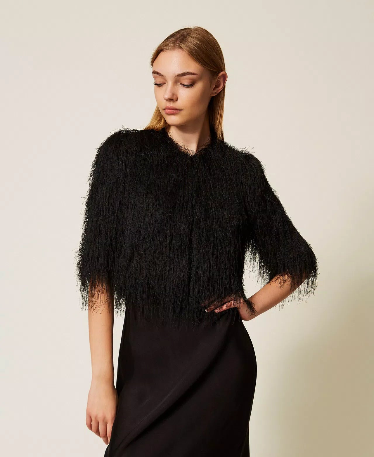 Cropped jacket with fringes