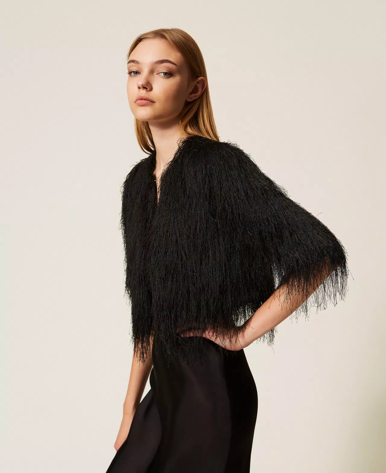 Cropped jacket with fringes