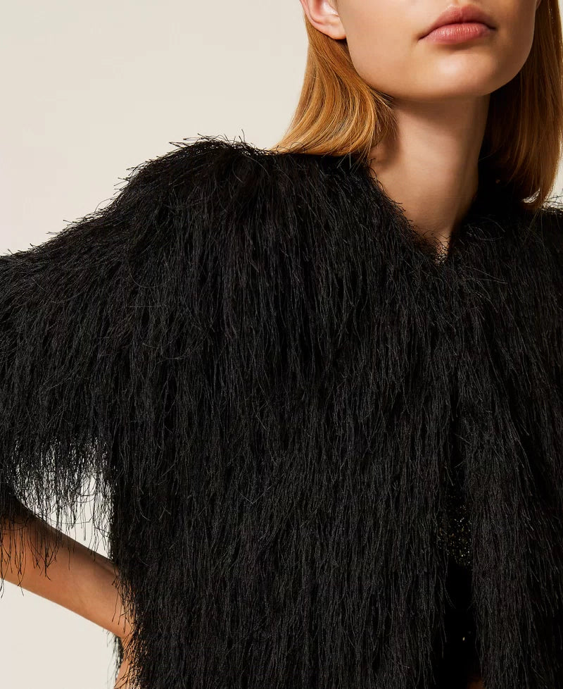 Cropped jacket with fringes