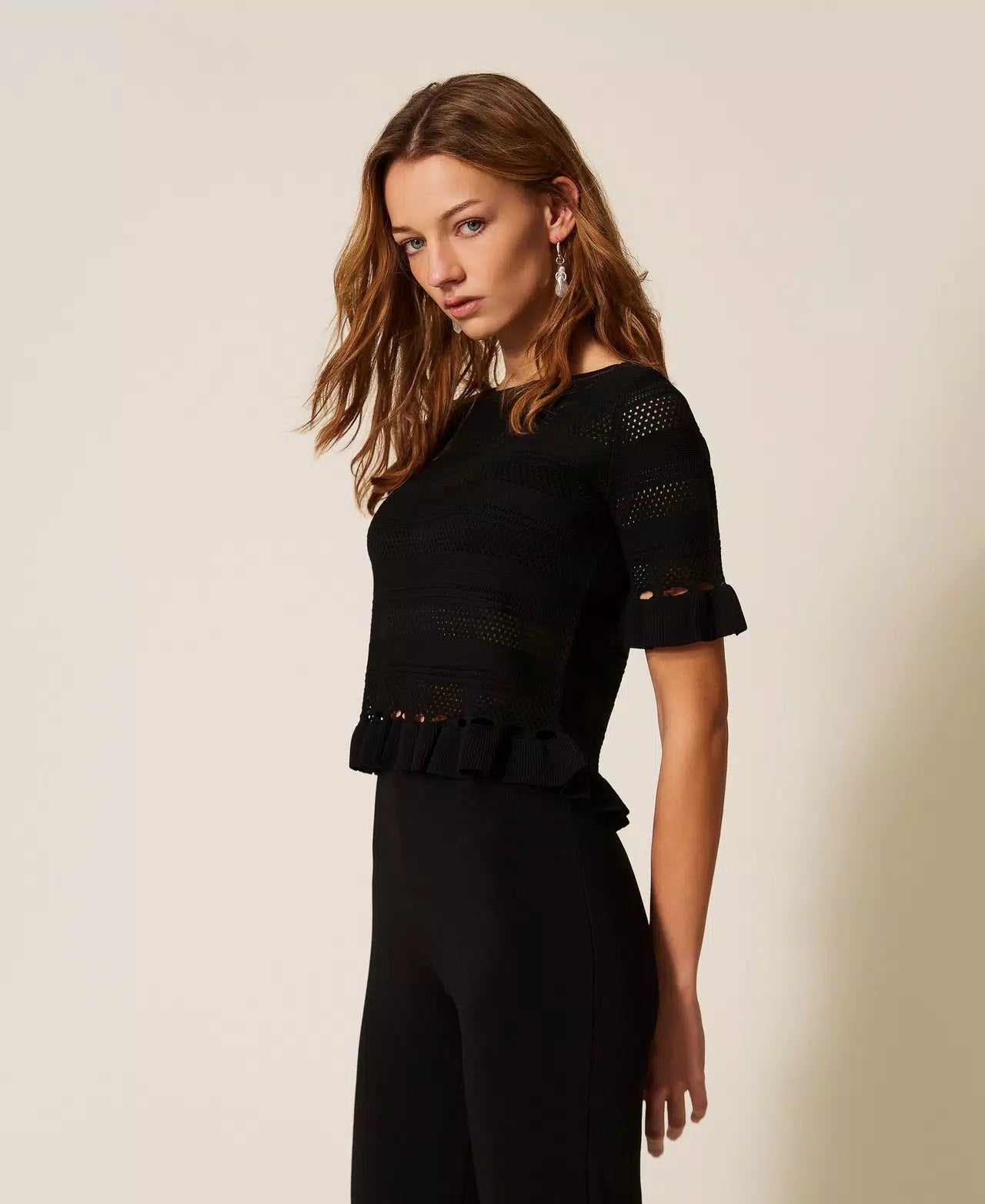 Black jumper with ruffles