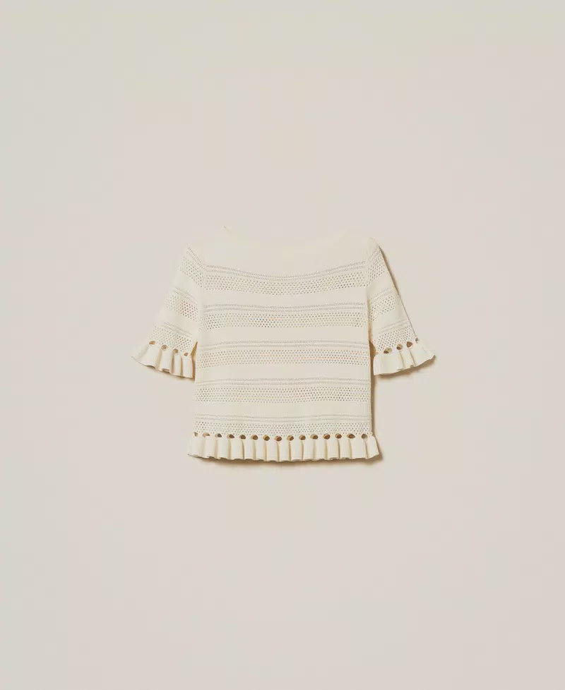 White jumper with ruffles