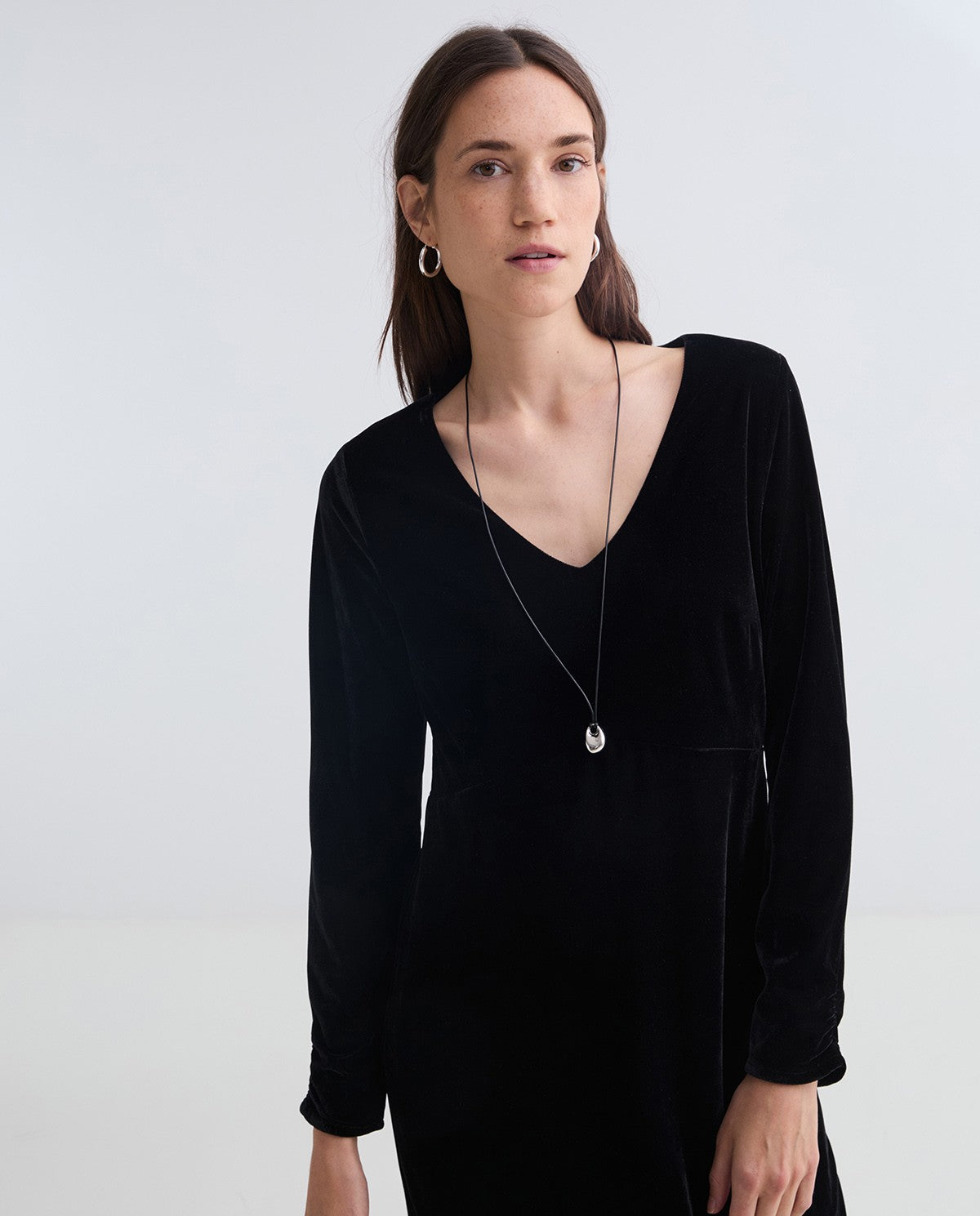 Black V-neck velvet midi dress