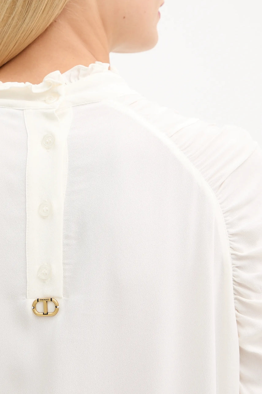 Blouse with gathering