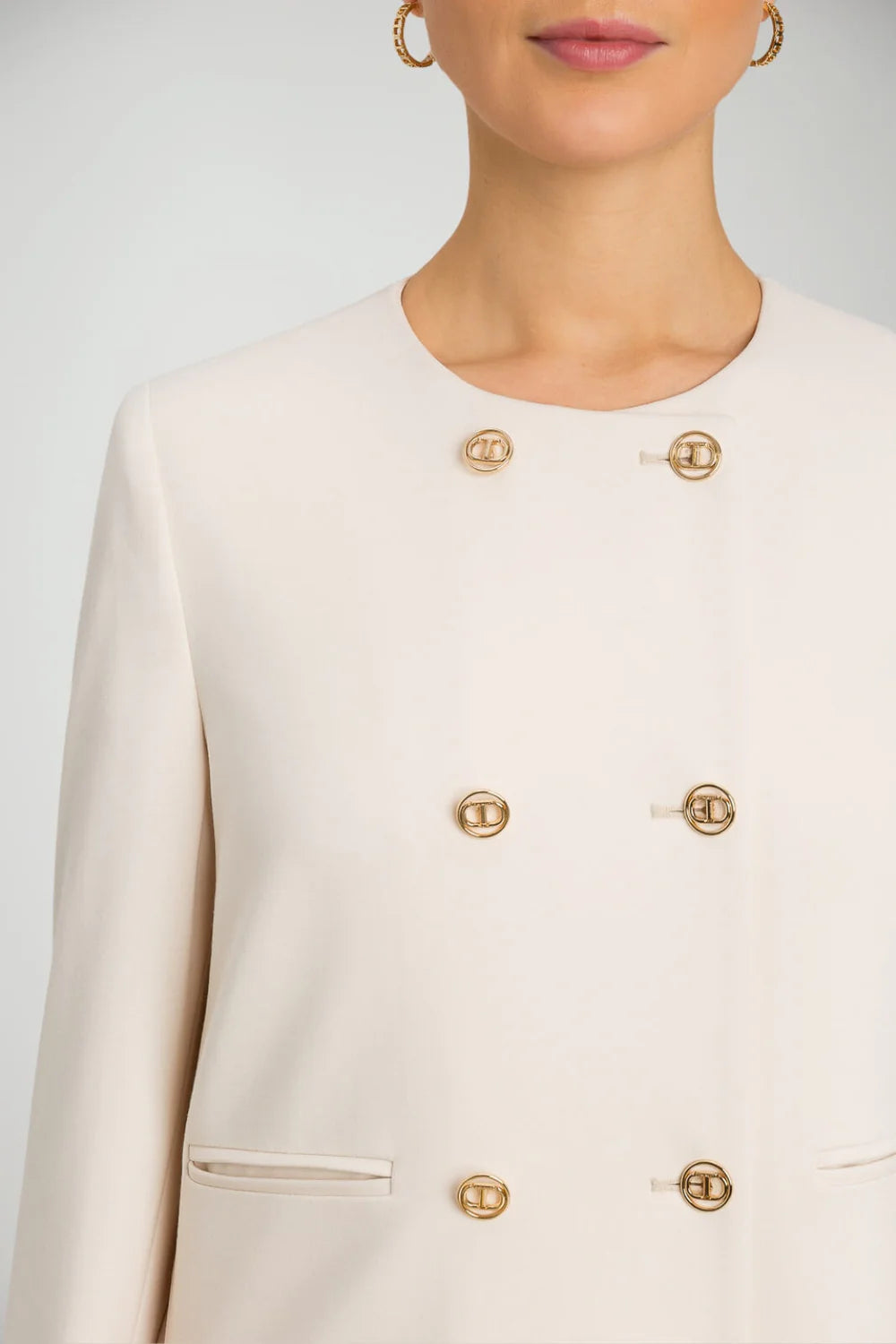 Blazer de punto con botones dorados