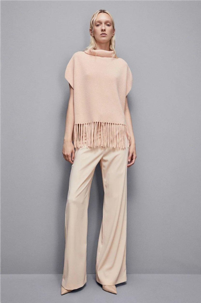 Poncho con flecos de lana orgánica