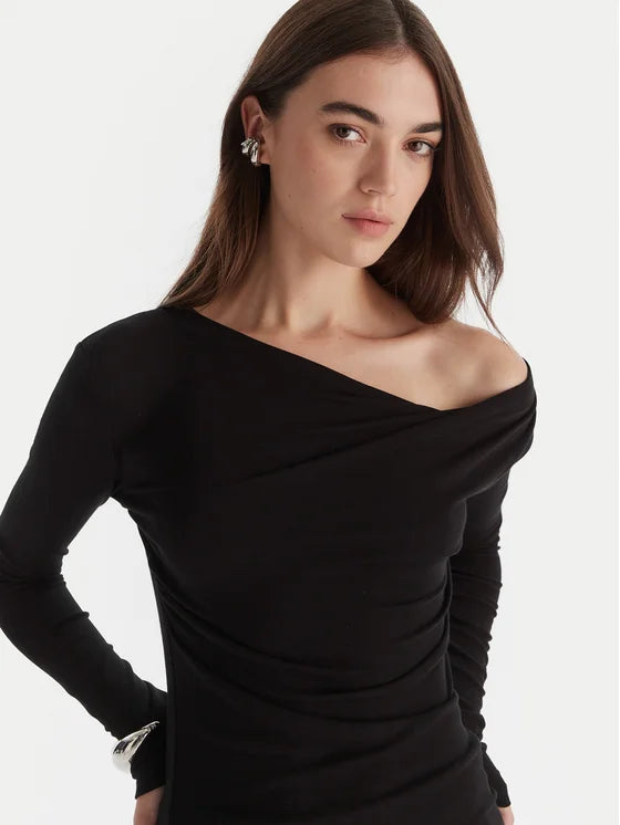 Top with asymmetrical neckline and draping
